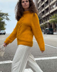Knitted sweater. Cable knit sweater.