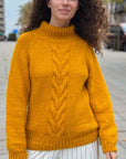 Knitted sweater. Cable knit sweater.